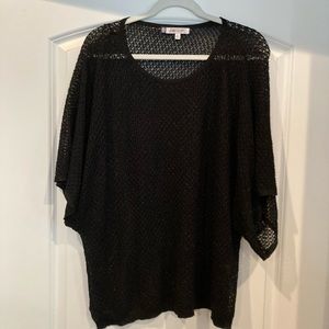 Jennifer Lopez sheer tunic.